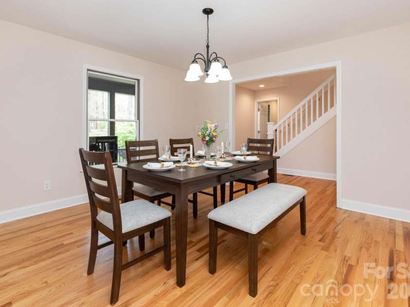 68 Sigmon Road, Fletcher, NC 28732.  MLS# CAR4336800, YatesRealty ID 18650. Formal dining room with hardwood floors—perfect for hosting gatherings and special occasions.