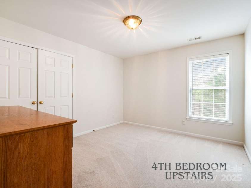 2620 Shady Reach Lane, Charlotte, NC 28214.  MLS# CAR4250616, YatesRealty ID 18655. 4th Bedroom with Double Door Closets