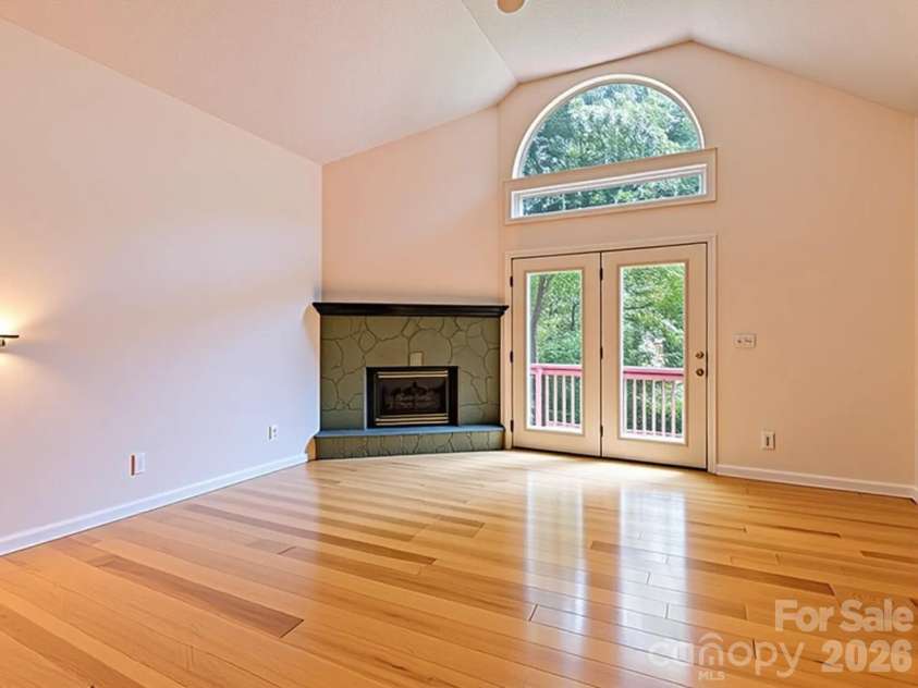 650 Creekside Drive, Maggie Valley, NC 28751.  MLS# CAR4335648, YatesRealty ID 18657. Empty living room