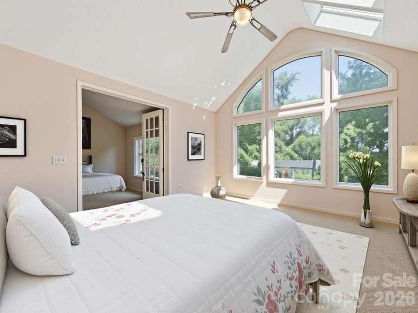650 Creekside Drive, Maggie Valley, NC 28751.  MLS# CAR4335648, YatesRealty ID 18657. Primary Suite digitally staged