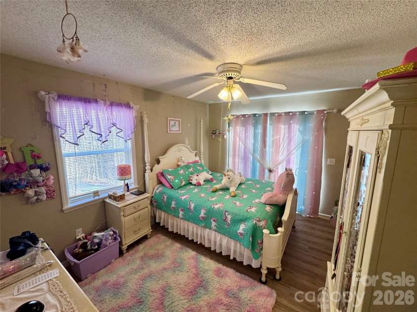 650 Creekside Drive, Maggie Valley, NC 28751.  MLS# CAR4335648, YatesRealty ID 18657. Second bedroom on the upper floor is where fairy tales begin