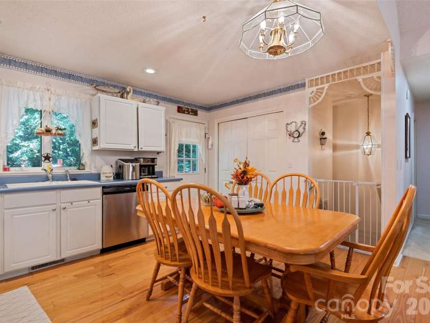 650 Creekside Drive, Maggie Valley, NC 28751.  MLS# CAR4335648, YatesRealty ID 18657. The open concept floor plan is perfect for entertaining guests where you can prep meals and entertain simultaneously in this well appointed kitchen
