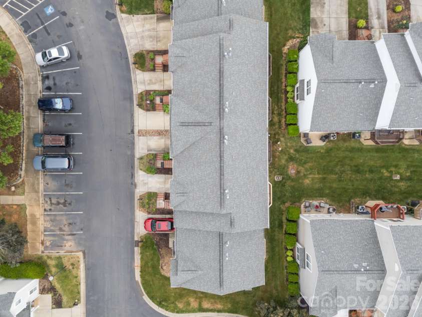 2750 Avalon Loop Road, Charlotte, NC 28269.  MLS# CAR4376282, YatesRealty ID 18660. Extra parking for guest across the way 