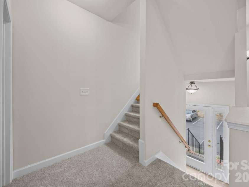 2750 Avalon Loop Road, Charlotte, NC 28269.  MLS# CAR4376282, YatesRealty ID 18660. Front door, split level entrance.