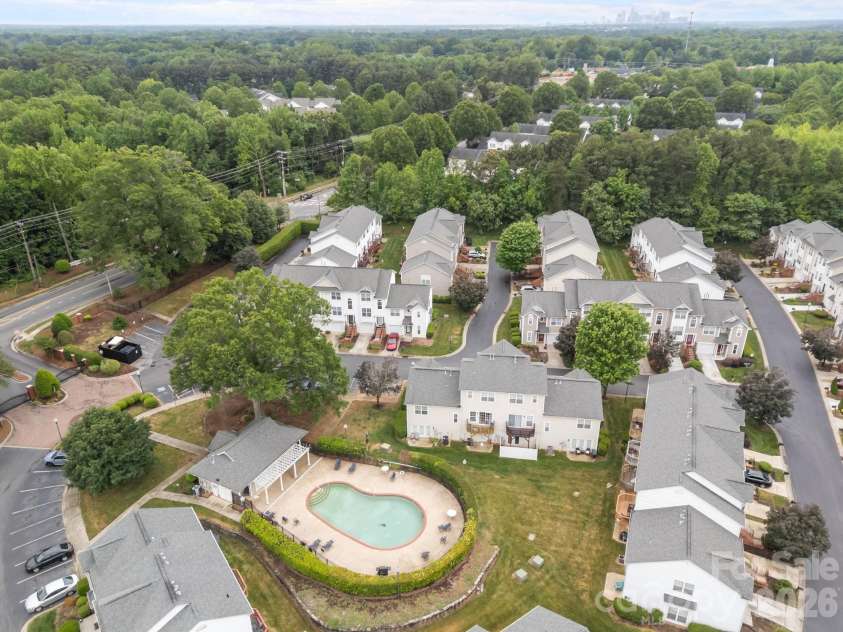 2750 Avalon Loop Road, Charlotte, NC 28269.  MLS# CAR4376282, YatesRealty ID 18660. Hello all, this photo you can see to the left side, GATED community. All residents get a gate code. You also see the clubhouse to the left of the pool.    