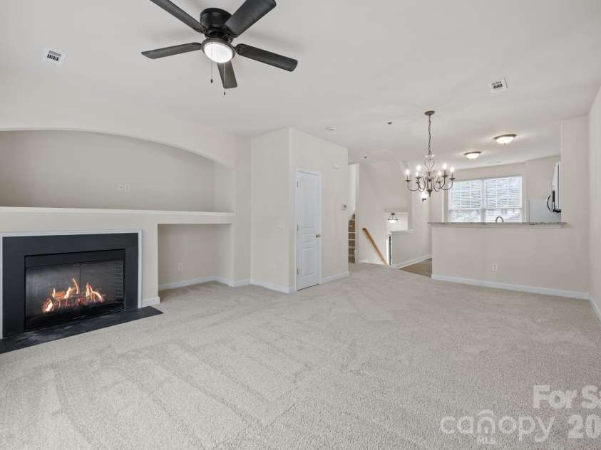 2750 Avalon Loop Road, Charlotte, NC 28269.  MLS# CAR4376282, YatesRealty ID 18660. Living/Family room open to Kitchen, excited to have areas to add your favorite things without extra nails in the wall?