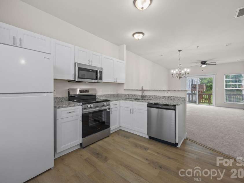 2750 Avalon Loop Road, Charlotte, NC 28269.  MLS# CAR4376282, YatesRealty ID 18660. Ready to pack your bags and move in? Open floorplan, gated community! 