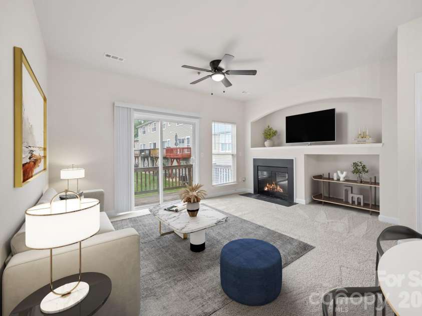 2750 Avalon Loop Road, Charlotte, NC 28269.  MLS# CAR4376282, YatesRealty ID 18660. Staged family pic from kitchen/breakfast area.