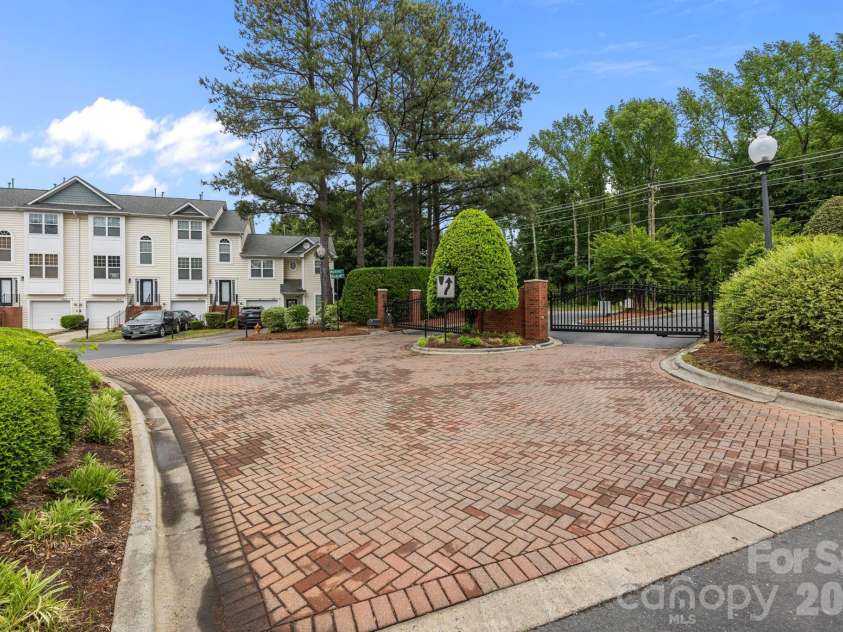 2750 Avalon Loop Road, Charlotte, NC 28269.  MLS# CAR4376282, YatesRealty ID 18660. Welcome to your gated community!