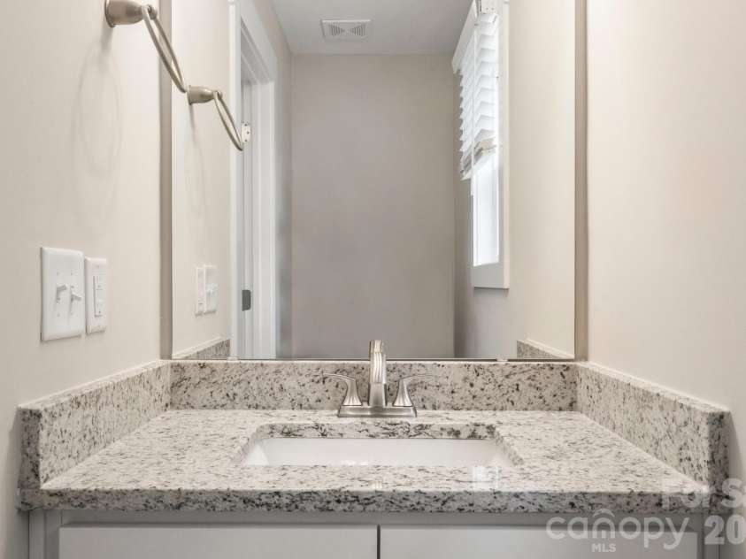 236 Elizabeth Avenue, Forest City, NC 28043.  MLS# CAR4252313, YatesRealty ID 18661. Guest bath on main