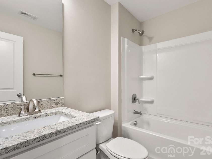 236 Elizabeth Avenue, Forest City, NC 28043.  MLS# CAR4252313, YatesRealty ID 18661. Hallway bath