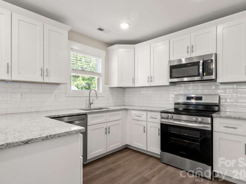 236 Elizabeth Avenue, Forest City, NC 28043.  MLS# CAR4252313, YatesRealty ID 18661. Kitchen with backsplash