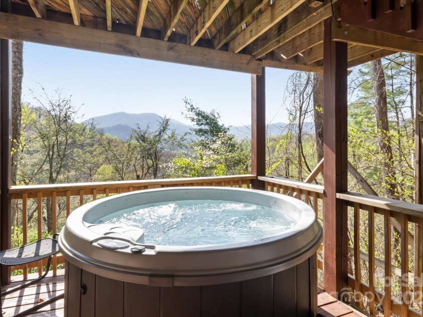 573 Countryside Drive, Waynesville, NC 28785.  MLS# CAR4244460, YatesRealty ID 18661. Hot Tub + Stunning Views