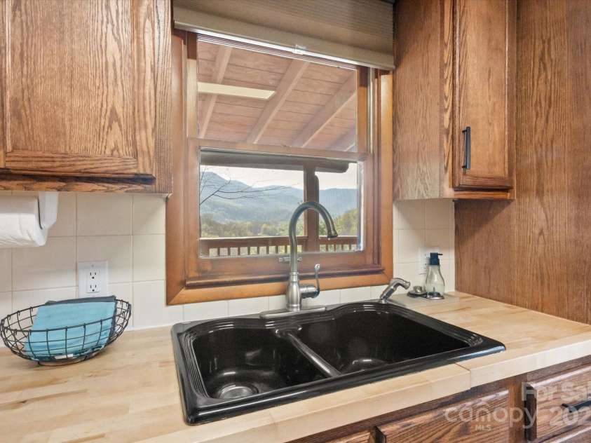 573 Countryside Drive, Waynesville, NC 28785.  MLS# CAR4244460, YatesRealty ID 18661. Kitchen Area