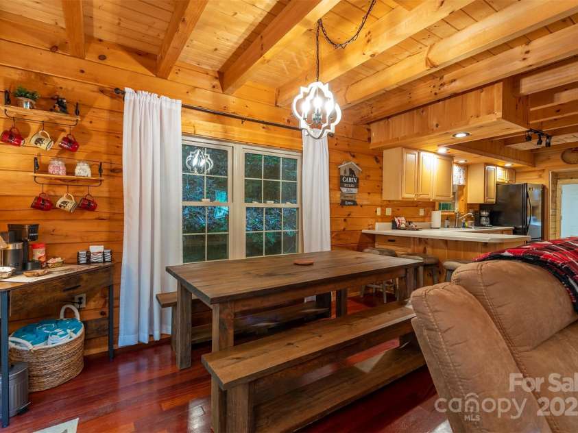 45 Ginger Lane, Waynesville, NC 28785.  MLS# CAR4256297, YatesRealty ID 18665. Dining area