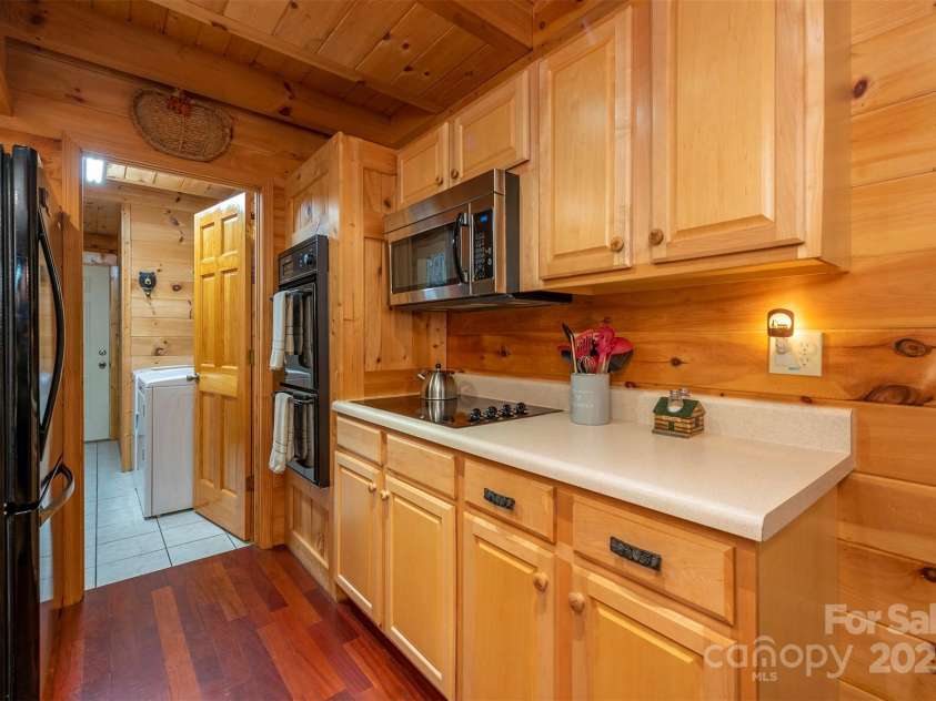 45 Ginger Lane, Waynesville, NC 28785.  MLS# CAR4256297, YatesRealty ID 18665. Kitchen on main