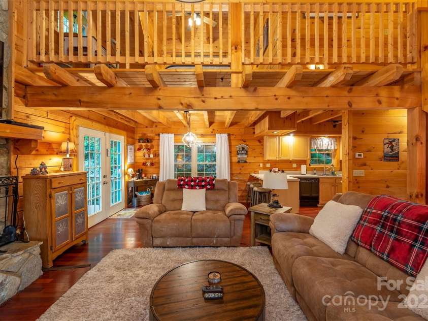 45 Ginger Lane, Waynesville, NC 28785.  MLS# CAR4256297, YatesRealty ID 18665. Living room/ Kitchen / Loft