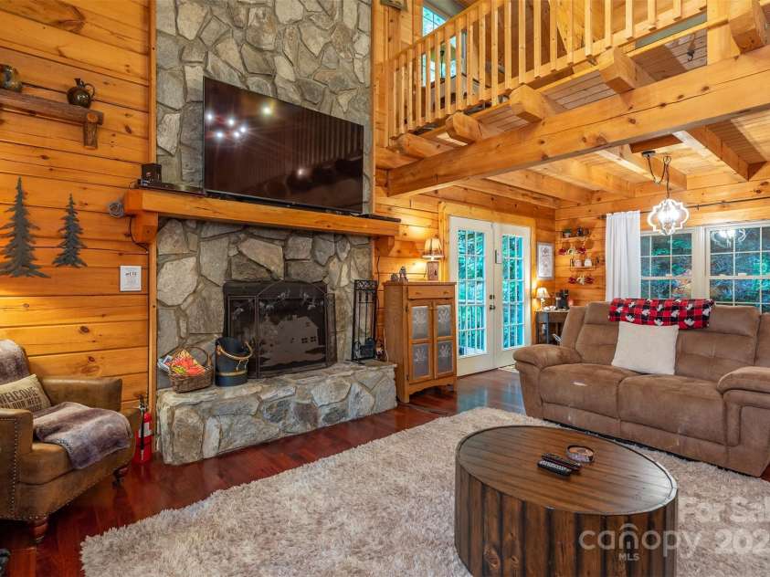 45 Ginger Lane, Waynesville, NC 28785.  MLS# CAR4256297, YatesRealty ID 18665. Living Room w fire place