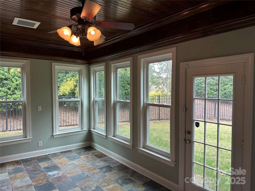 10715 Tom Short Road, Charlotte, NC 28277.  MLS# CAR4263711, YatesRealty ID 18666. Finished Heated Sunroom