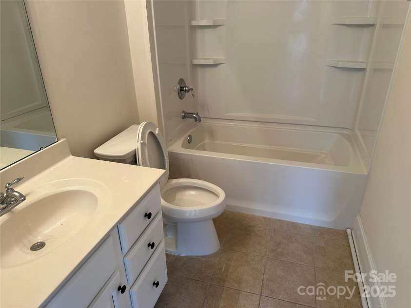 10715 Tom Short Road, Charlotte, NC 28277.  MLS# CAR4263711, YatesRealty ID 18666. Second Floor Bathroom