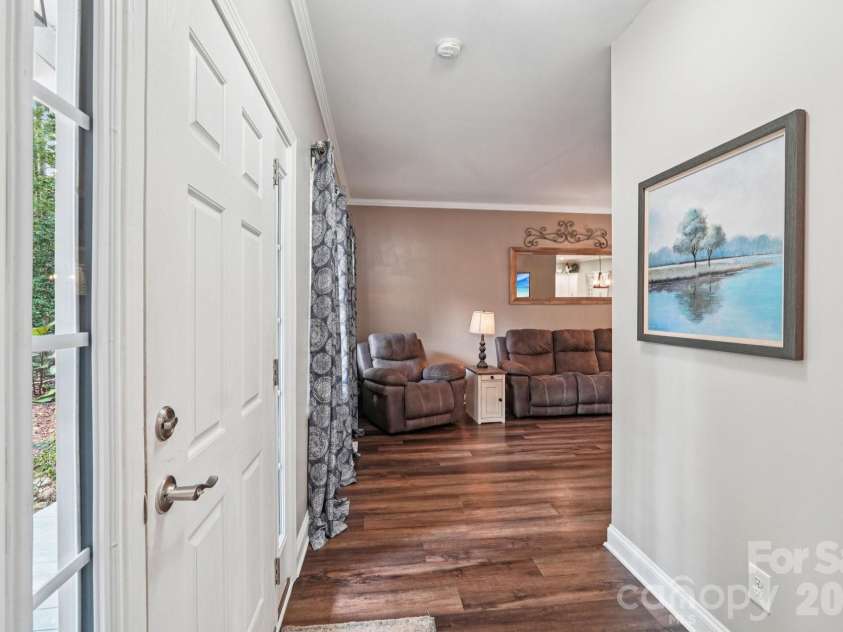 589 Newport Drive, Mount Gilead, NC 27306.  MLS# CAR4306770, YatesRealty ID 18667. Front Door looking left.