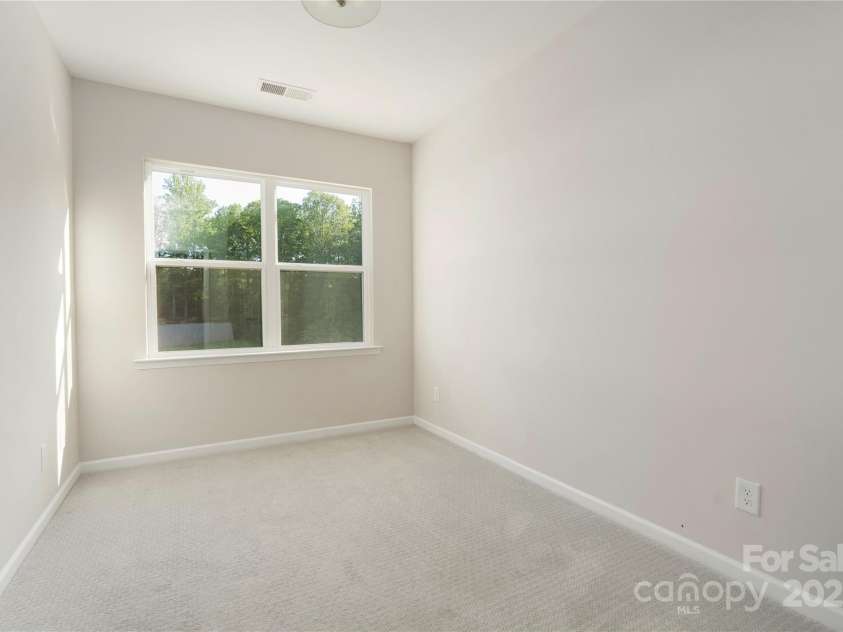 131 Berkeley Avenue, Mooresville, NC 28117.  MLS# CAR4249397, YatesRealty ID 18668. Guest bedroom.