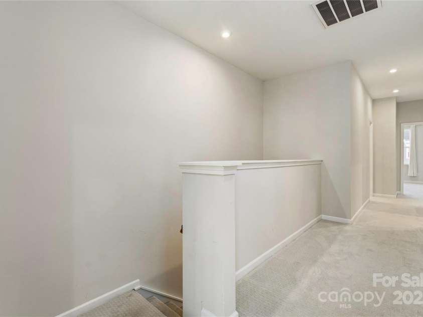 131 Berkeley Avenue, Mooresville, NC 28117.  MLS# CAR4249397, YatesRealty ID 18668. Upstairs hallway.