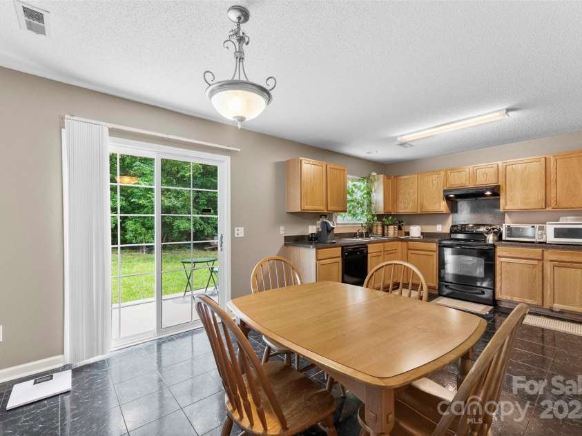 6229 Sid Crane Drive, Charlotte, NC 28216.  MLS# CAR4265396, YatesRealty ID 18670. 