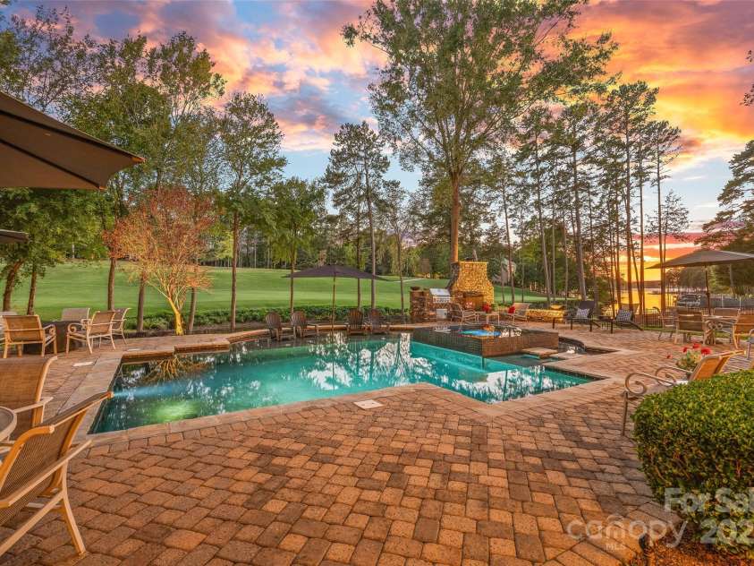 143 Jeremy Point Place, Mooresville, NC 28117.  MLS# CAR4307571, YatesRealty ID 18672. Custom Heated Salt Water Pool & Spa