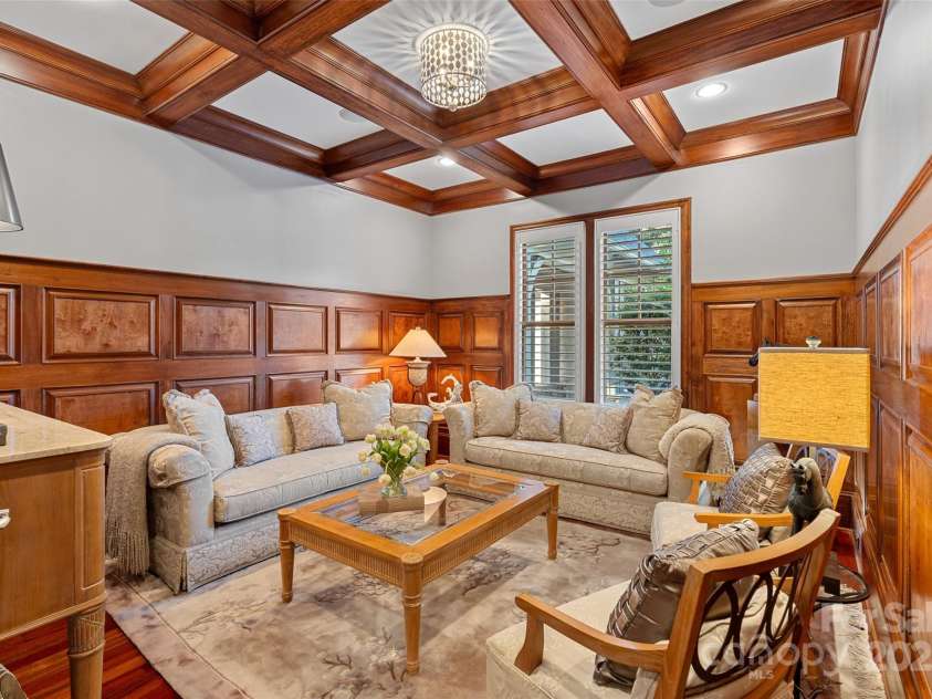 143 Jeremy Point Place, Mooresville, NC 28117.  MLS# CAR4307571, YatesRealty ID 18672. Custom Paneled Wood Wainscot Molding and a coffered ceiling