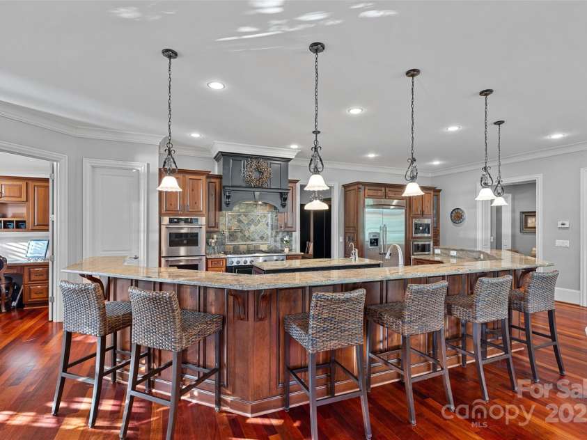 143 Jeremy Point Place, Mooresville, NC 28117.  MLS# CAR4307571, YatesRealty ID 18672. Oversized Island w/ Seating for 12