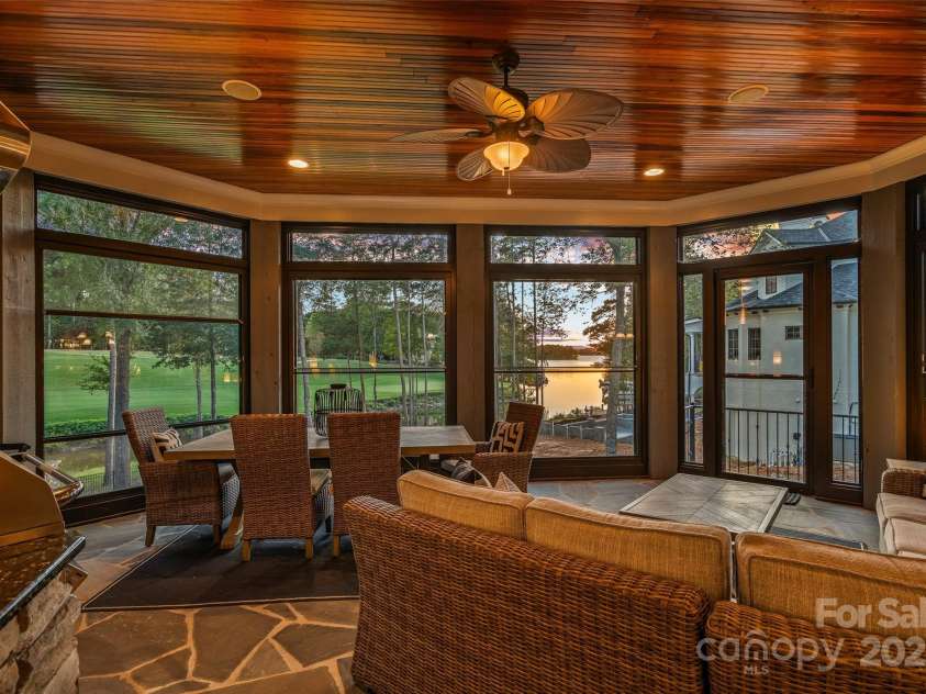 143 Jeremy Point Place, Mooresville, NC 28117.  MLS# CAR4307571, YatesRealty ID 18672. Solarium w/ retractable glass and screen system for year round enjoyment