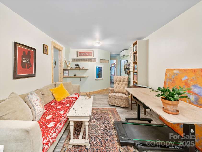278 Mount View Drive, Burnsville, NC 28714.  MLS# CAR4259285, YatesRealty ID 18673. Basement Level Mother-in-Law Suite (Living Room)
