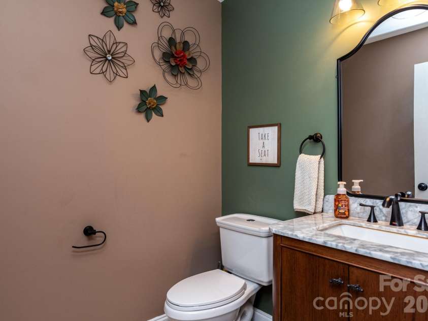 1091 ROLLINGWOOD Drive, Claremont, NC 28610.  MLS# CAR4374455, YatesRealty ID 18678. 1/2 bath on main 