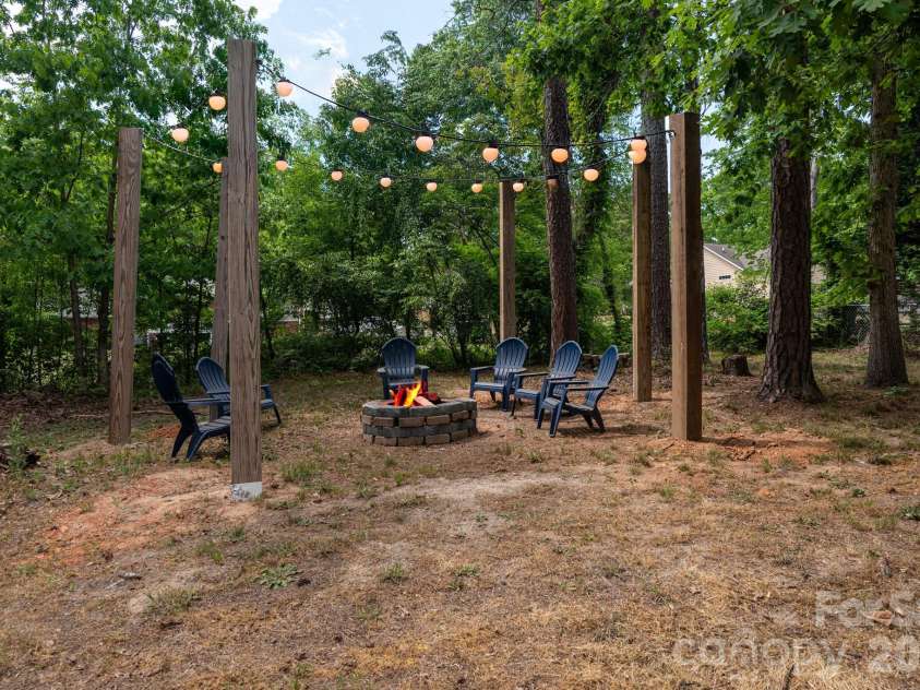 1091 ROLLINGWOOD Drive, Claremont, NC 28610.  MLS# CAR4374455, YatesRealty ID 18678. Firepit