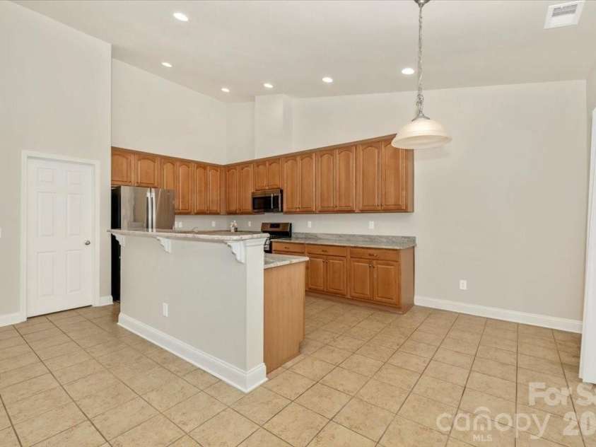 241 Loch Stone Street, Fort Mill, SC 29715.  MLS# CAR4334932, YatesRealty ID 18680. Kitchen 