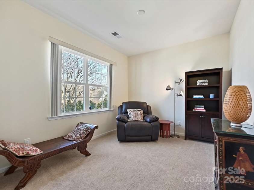 11621 Red Knoll Lane, Pineville, NC 28134.  MLS# CAR4238844, YatesRealty ID 18689. Downstairs front Sitting Room/ Living Room