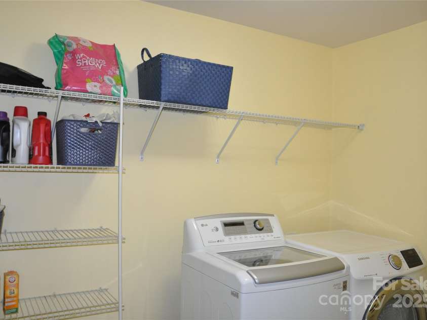 11621 Red Knoll Lane, Pineville, NC 28134.  MLS# CAR4238844, YatesRealty ID 18689. Laundry Room upstairs by bedrooms