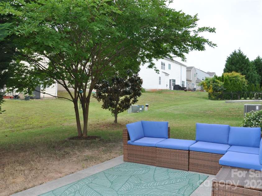 11621 Red Knoll Lane, Pineville, NC 28134.  MLS# CAR4238844, YatesRealty ID 18689. Relax on the patio