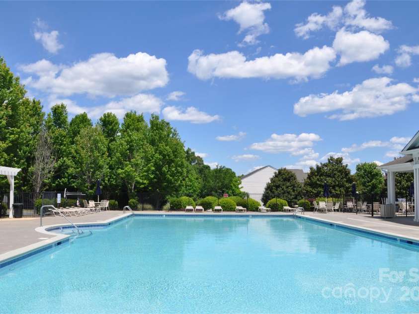 11621 Red Knoll Lane, Pineville, NC 28134.  MLS# CAR4238844, YatesRealty ID 18689. Take a dip in the pool!