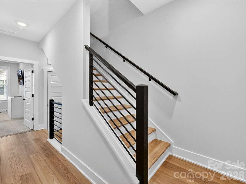 2024 Terwilliger Terrace, Charlotte, NC 28203.  MLS# CAR4354818, YatesRealty ID 18690. Staircase to 4th Floor