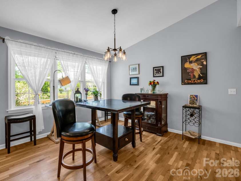 179 Kingfisher Lane, Mills River, NC 28759.  MLS# CAR4371659, YatesRealty ID 18691. Dining area overlooking pond
