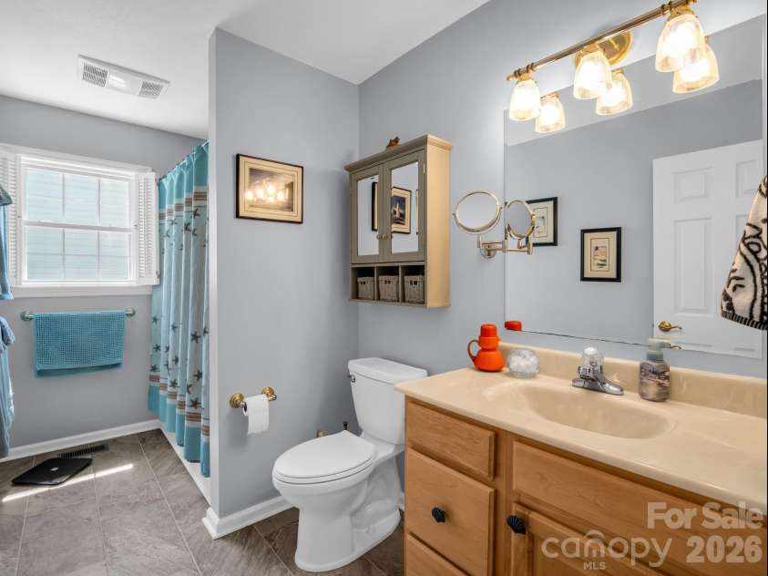 179 Kingfisher Lane, Mills River, NC 28759.  MLS# CAR4371659, YatesRealty ID 18691. Hall bath