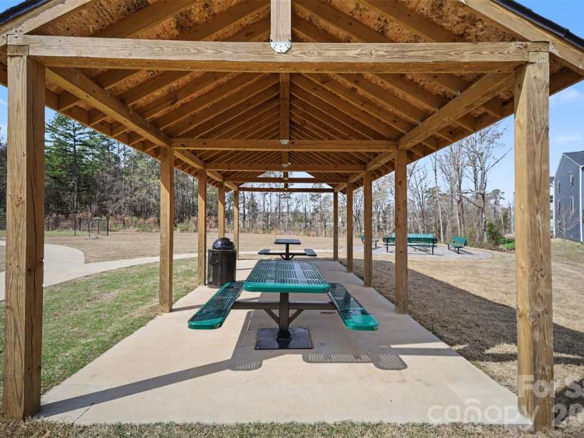 1211 May Apple Drive, Matthews, NC 28104.  MLS# CAR4349780, YatesRealty ID 18695. Community picnic pavilion with covered seating and walking paths