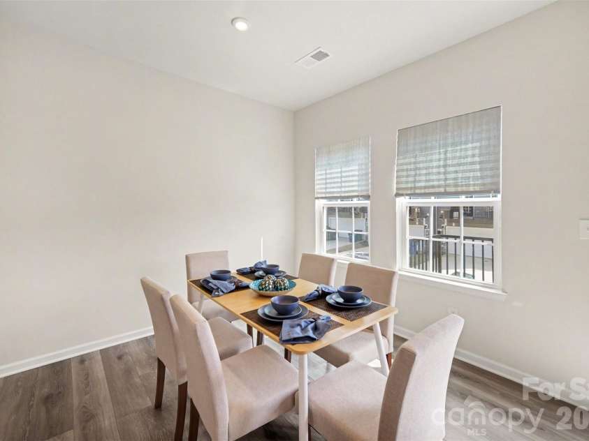 1211 May Apple Drive, Matthews, NC 28104.  MLS# CAR4349780, YatesRealty ID 18695. Generous dining space