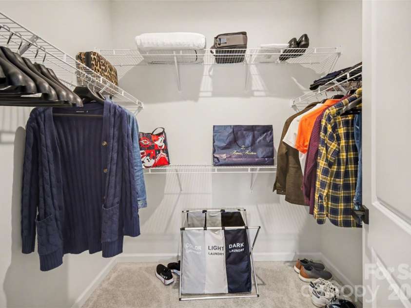 1211 May Apple Drive, Matthews, NC 28104.  MLS# CAR4349780, YatesRealty ID 18695. Spacious primary bedroom walk-in closet