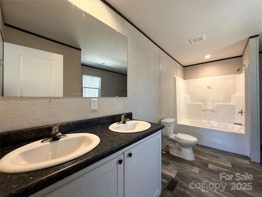 237 Deberry Way, Morven, NC 28119.  MLS# CAR4225456, YatesRealty ID 18699. Primary Bath