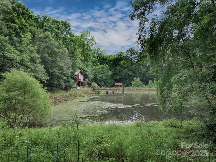 269 Johnson Dairy Road, Mooresville, NC 28115.  MLS# CAR4260297, YatesRealty ID 18702. Cabin and Pond