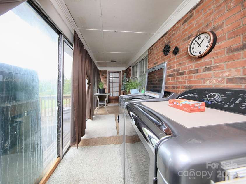 269 Johnson Dairy Road, Mooresville, NC 28115.  MLS# CAR4260297, YatesRealty ID 18702. Screened porch (washer and dryer hook up for 2nd living quarters)