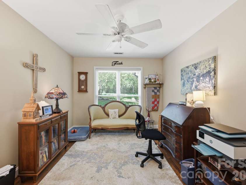 145 Upper Spencer Mountain Road, Stanley, NC 28164.  MLS# CAR4378025, YatesRealty ID 18703. Currently, this room is utilized as a Home Office. However, flexibility is key - it can be an exercise room or anything your lifestyle requires!